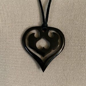 Black Carved Heart Pendant on Silk Cord